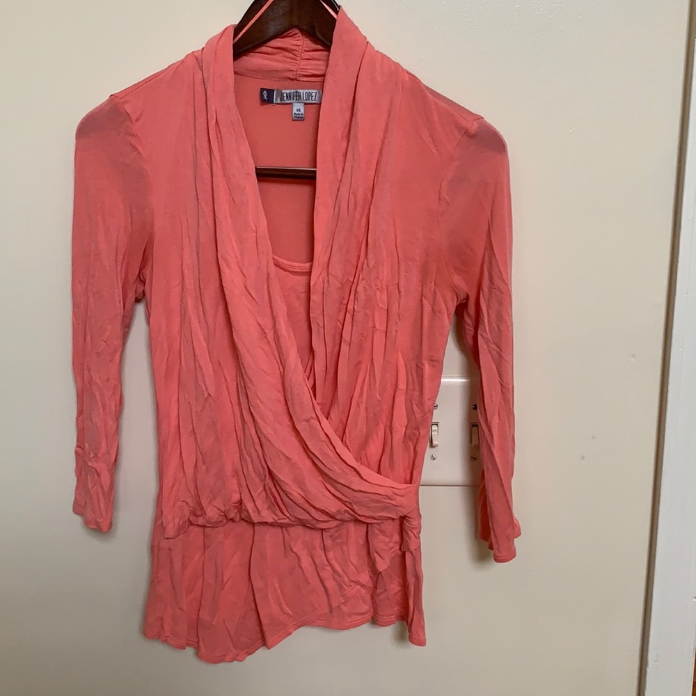 Faux wrap asymmetrical hem top
